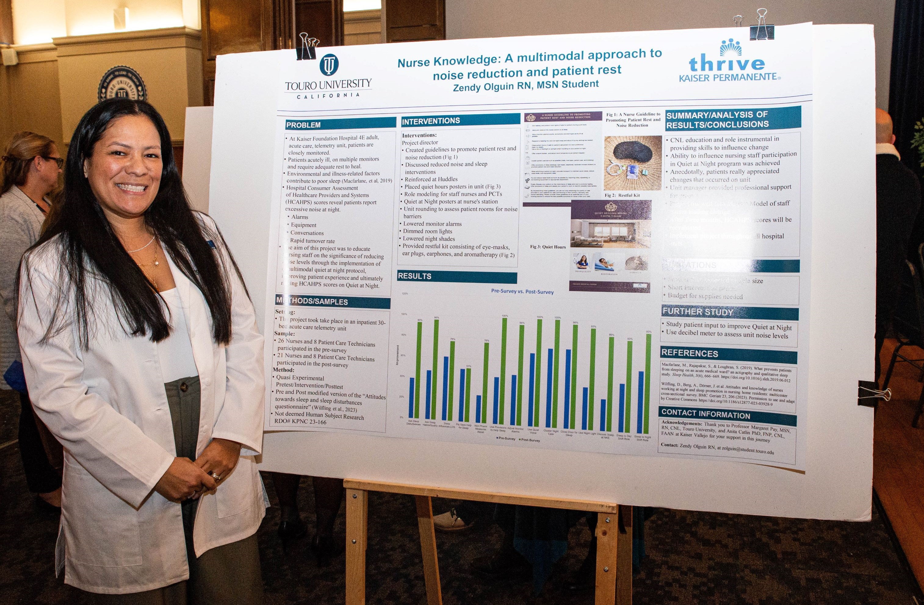 Nursing student Zendy Olguin stands in front of her project on the quality of sleep in hospital telemetry units