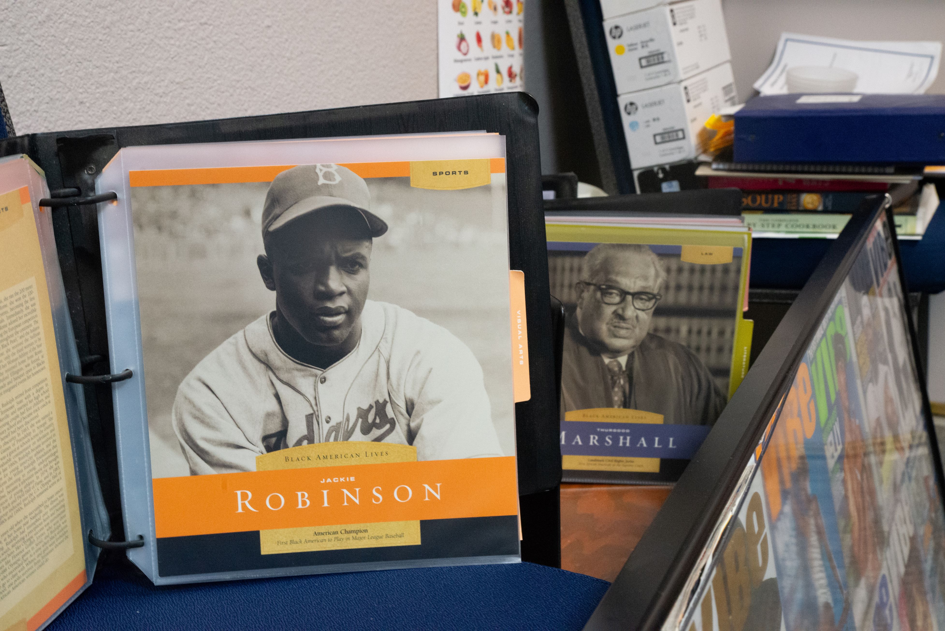 Close up of chef Raymond Nottie's collection of African American heros