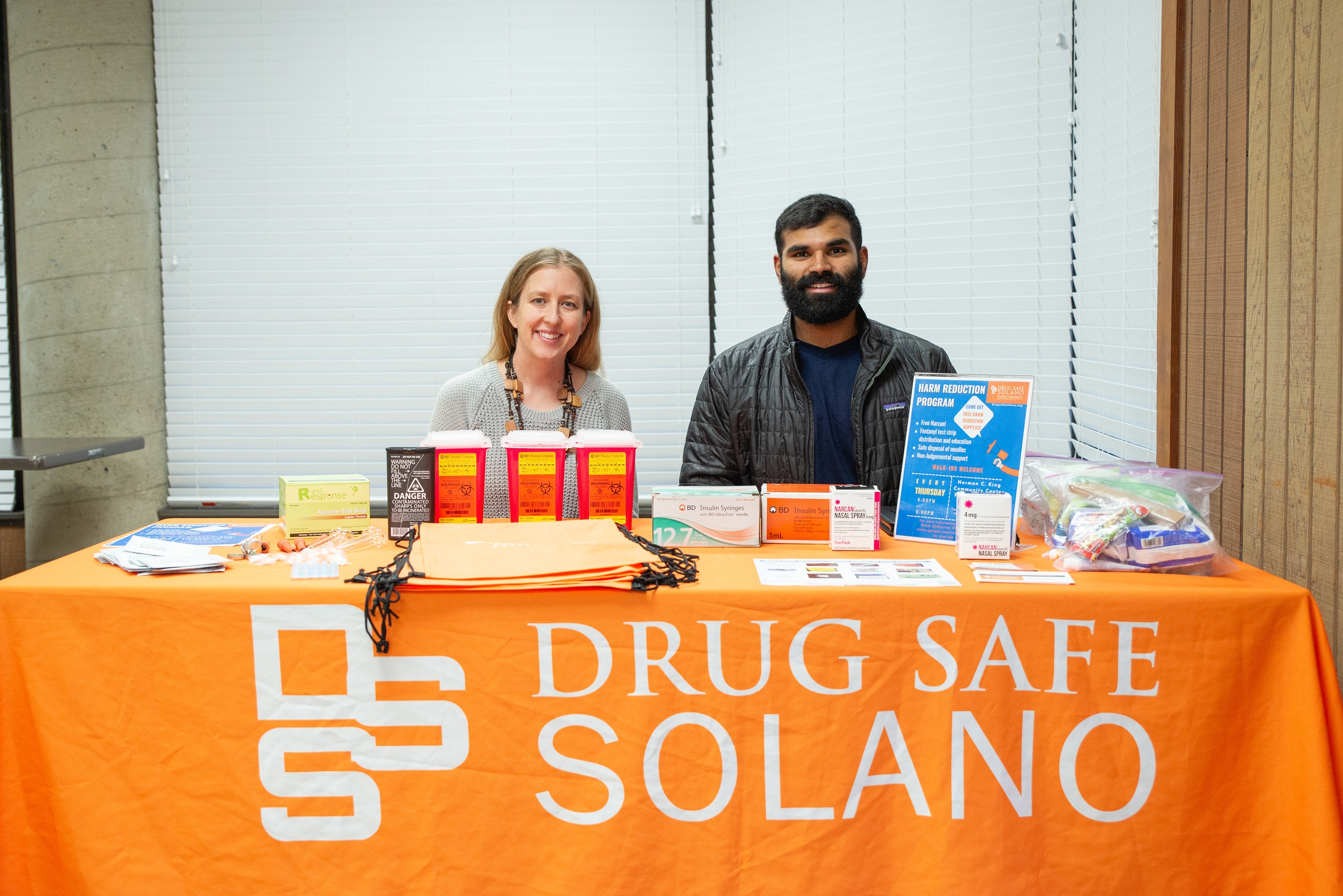 Dr. Christina Kinnevey and Amrit Banga (College of Osteopathic Medicine Class of 2026; MSMHS Graduate) at the Drug Safe Solano table during the weekly TUC Student Run Free Clinic.
