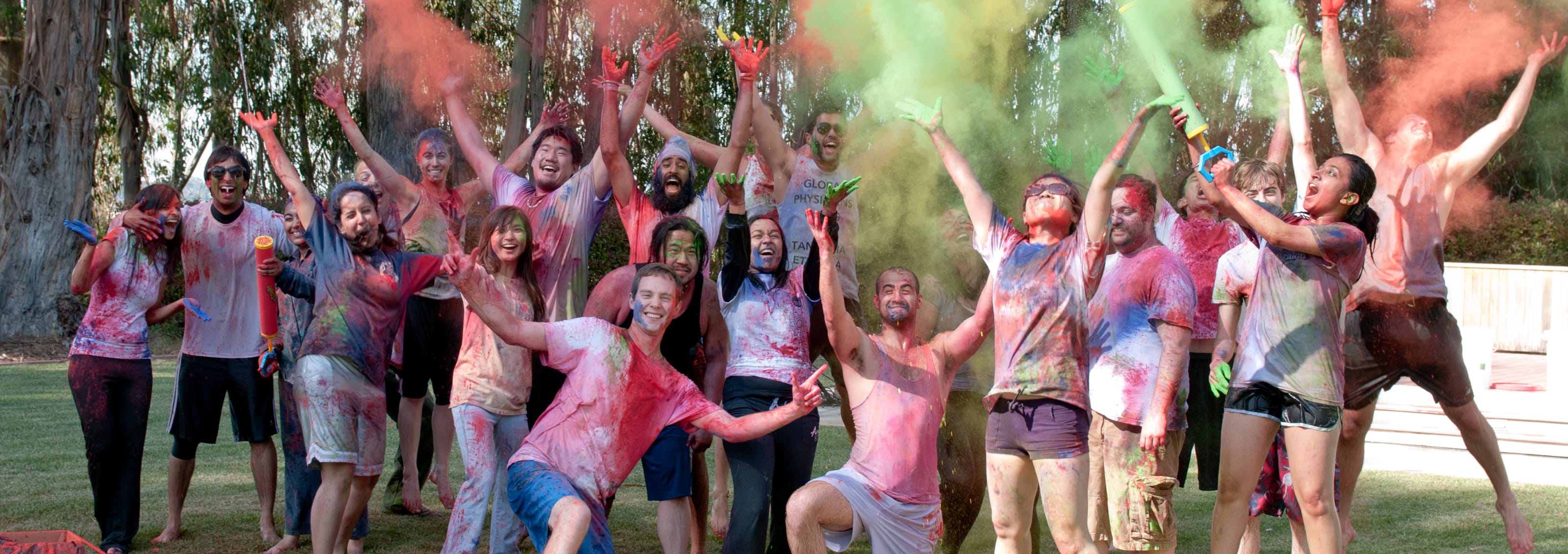 group of TUC students covered in different colored paint