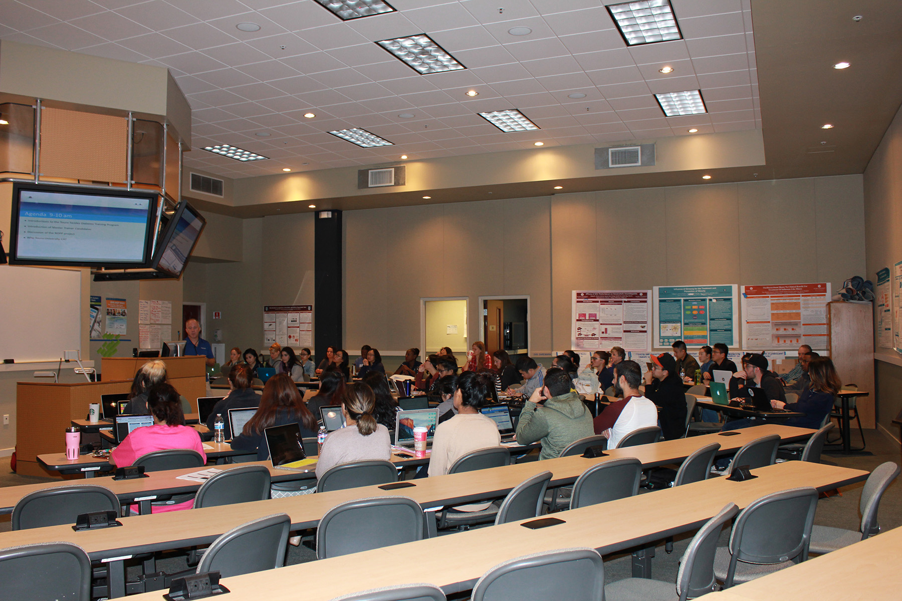 Diverse group of people in a classroom training