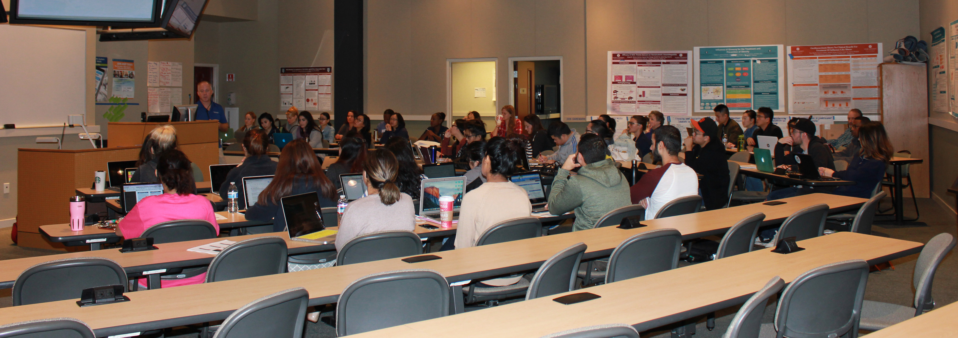 Diverse group of people in a classroom training