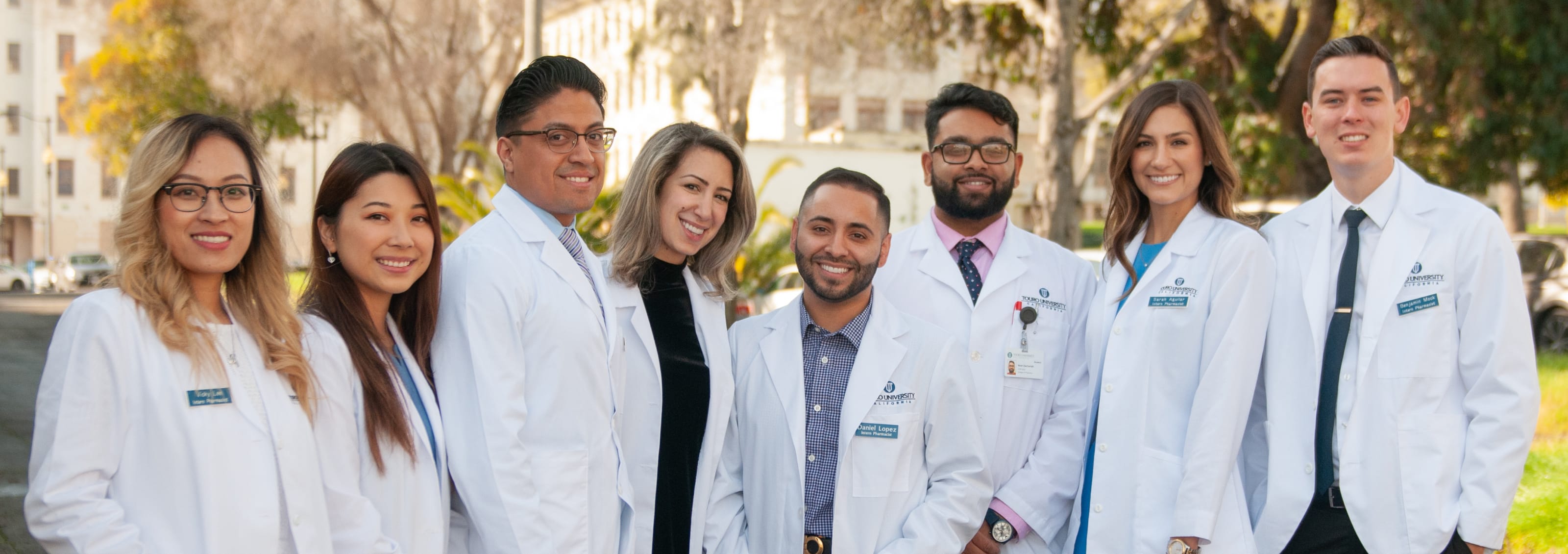 Group photo of Touro California COP students in white coats