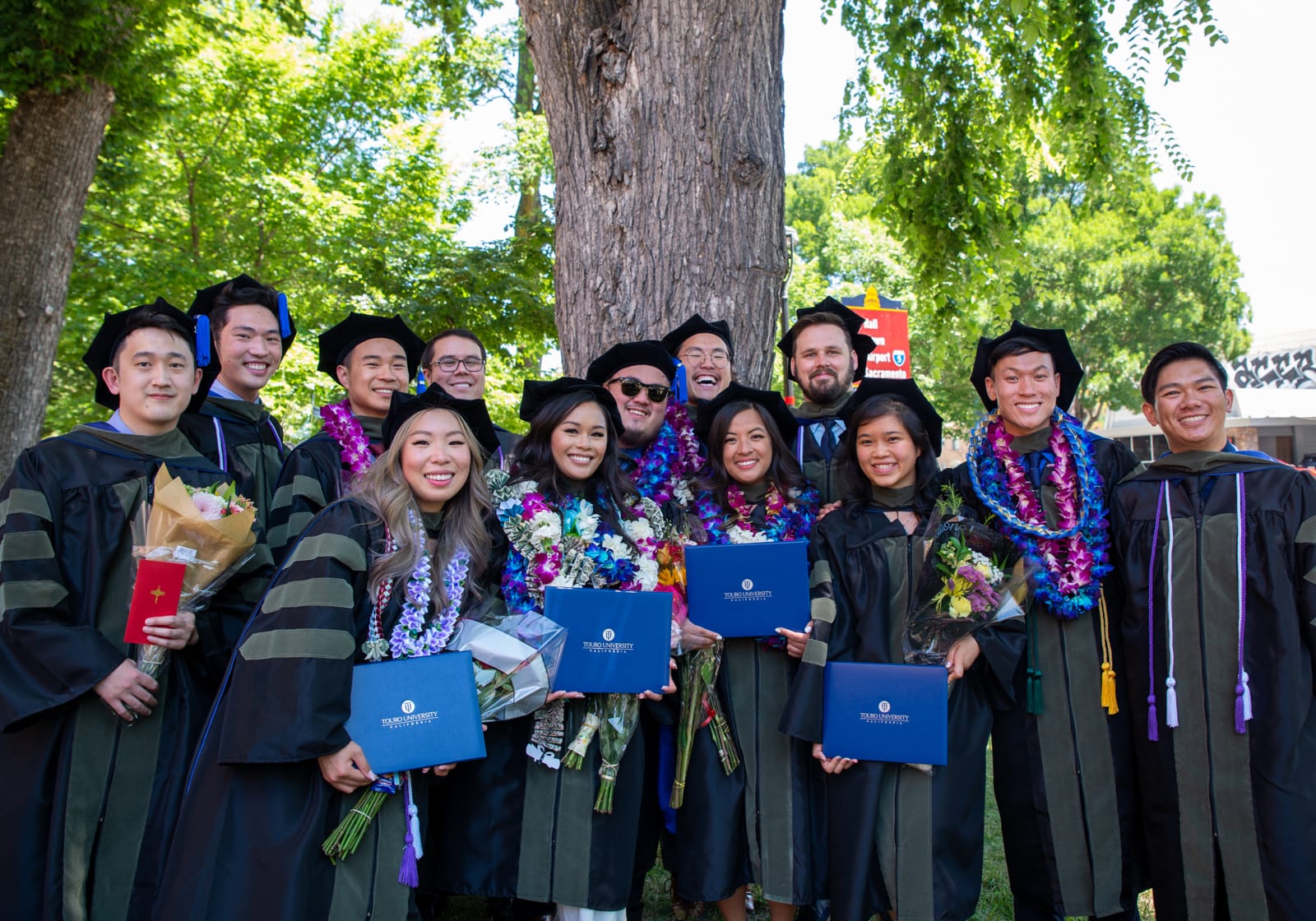 group of graduating TUC students in caps and gowns