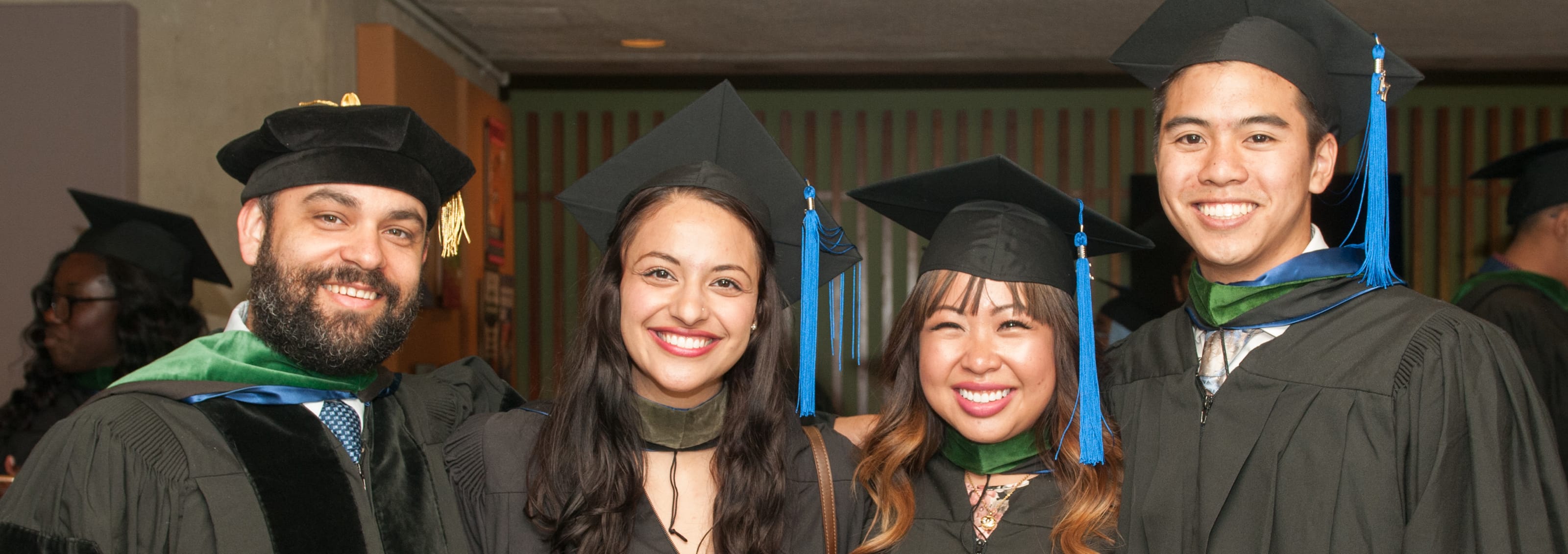 group of graduating students in caps and gowns