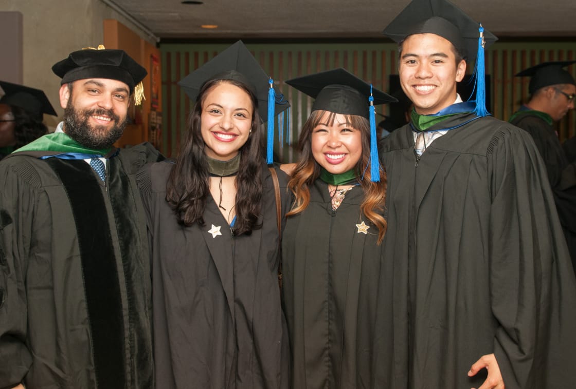 group of graduating students in caps and gowns