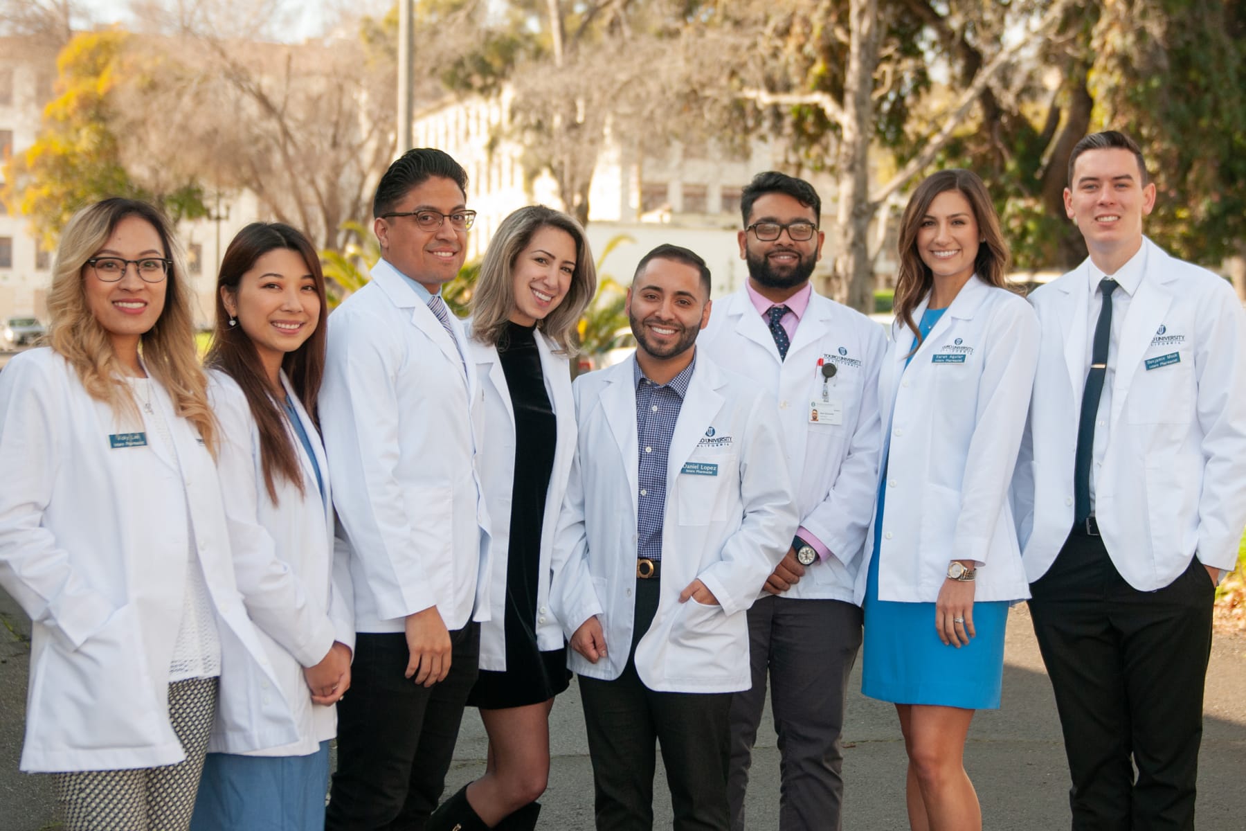 Group photo of Touro California COP students in white coats