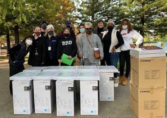 Giving Air Purifiers at Grace Patterson