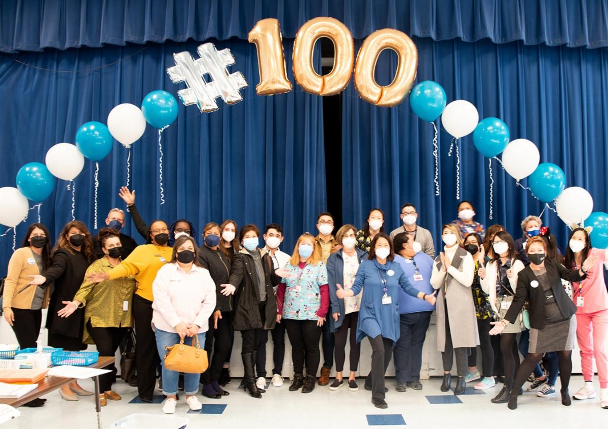 Supporters Applaud the 100th Vaccine Clinic