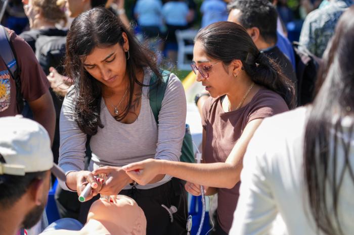 A photo shows students practicing intubation on a medical dummy during Touro University California\'s annual Club and Resource Day, Tuesday, Aug. 11, 2026.