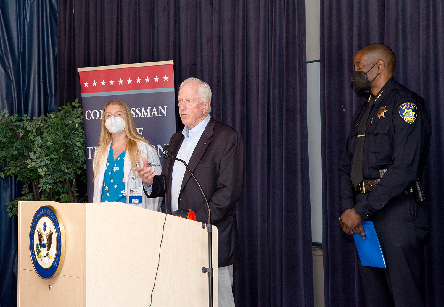 Student doctor Molly Tobin, Rep. Mike Thompson and Vallejo police chief Shawny Williams stand at a podium during a press conference dealing with a plan to get so-called ghost guns off Vallejo streets.