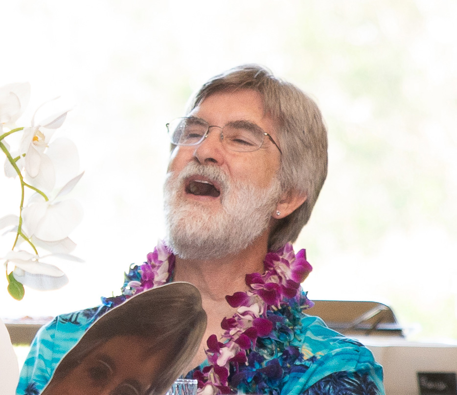 The photo shows Dr. James Binkerd laughing during a retirement celebration for Binkerd at the Farragut Inn Ballroom at Touro University California, Wednesday, May 31, 2023.