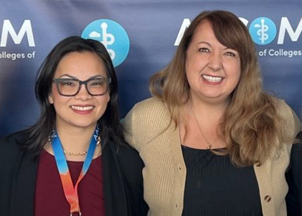 A photo shows Drs. May Lin and Tami Hendriksz in mid-April during the American Association of Osteopathic Medicine’s Educating Leaders ’24 conference in Kansas City.