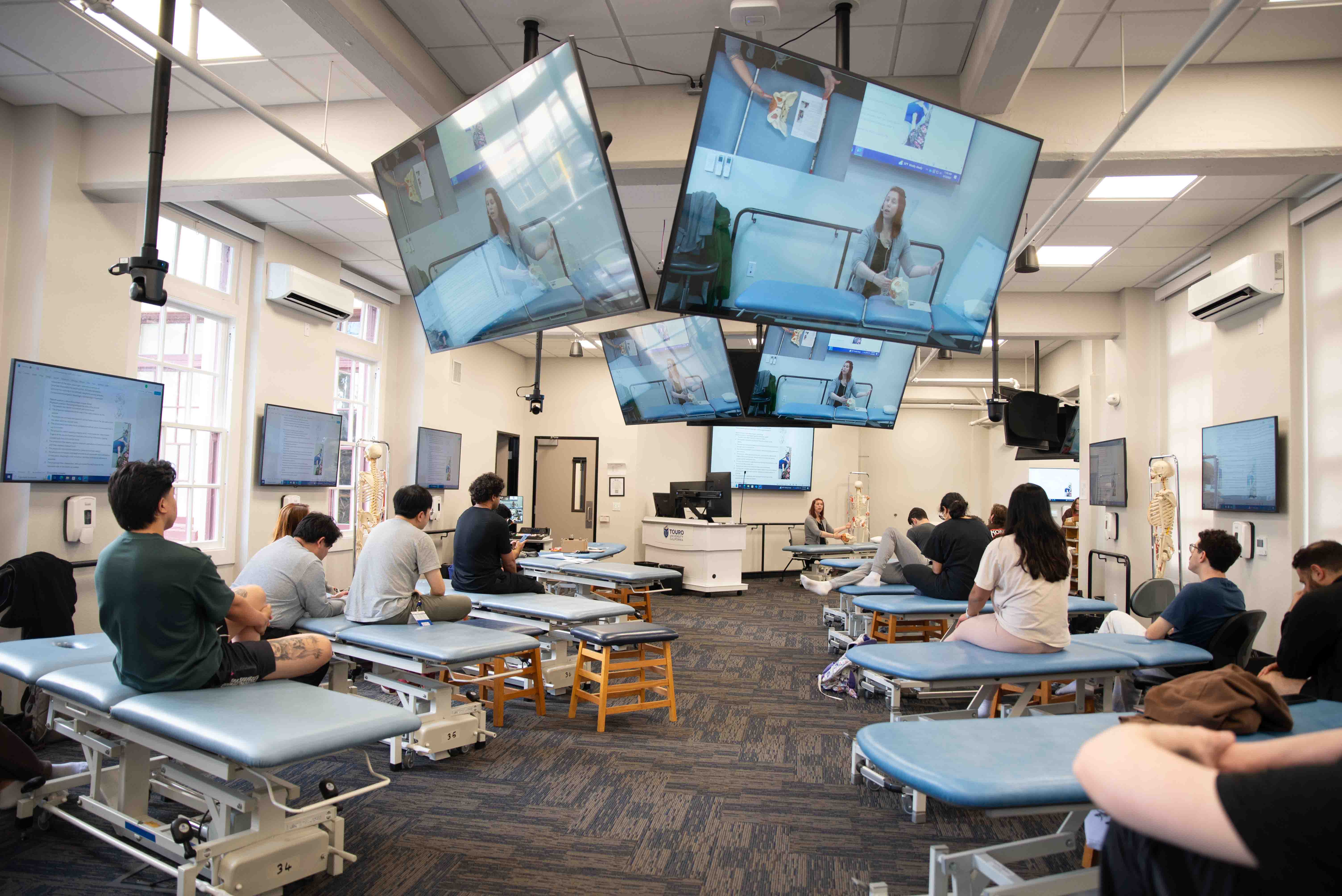 Students from the College of Osteopathic Medicine sit during a lecture on Osteopathic Manipulative Medicine.